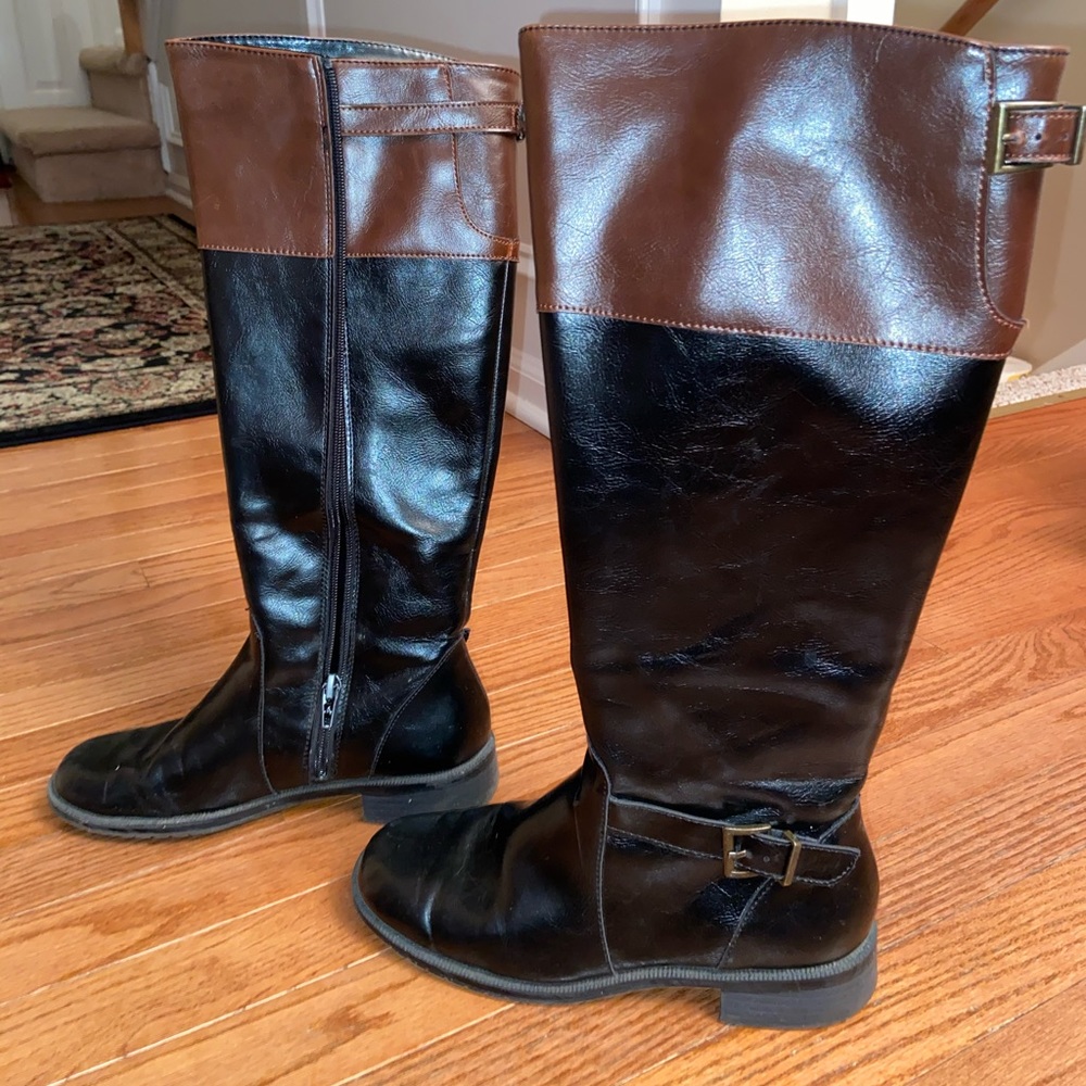 Tall brown and black riding boots